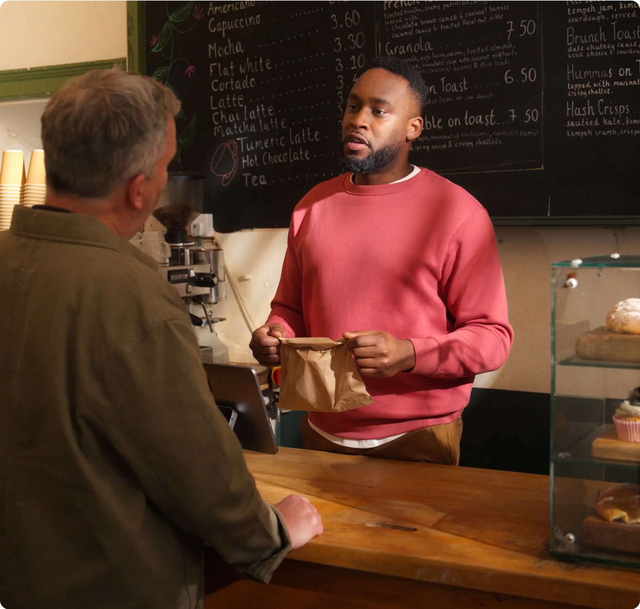 WEB BrandPhoto Hero ThemaHighlight Bento Kassierer Kunde Bäckerei E04 E06